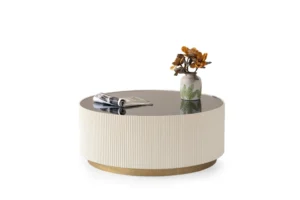 Round cream wood coffee table with brushed gold wood base and black glass top