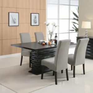 A modern dining room set with a black rectangular table and four grey upholstered chairs.
