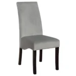 A close-up of the gray velvet dining chair's upholstery and subtle stitching detail.