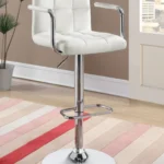 Palomar Adjustable Height Bar Stool in White Faux Leather with Tufted Back, Armrests, and Chrome Pedestal Base In The room.