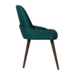 Green dining chair with micro velvet upholstery and walnut wooden legs side view