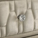 Close-up of crystal hardware and tufted velvet texture on Lorient furniture.
