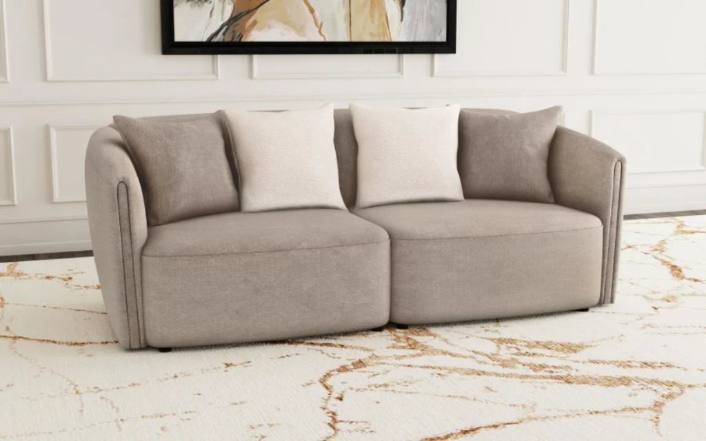 Townsend chenille upholstered rolled arm sofa in latte with wave-patterned fabric and accent pillows