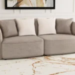 Townsend chenille upholstered rolled arm sofa in latte with wave-patterned fabric and accent pillows