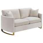 Corliss beige velvet loveseat with curved arms and gold legs
