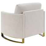 Corliss beige velvet accent armchair with curved arms and gold legs