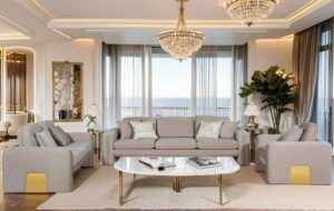 Gaston 3-piece taupe velvet sofa set with gold metal accents – includes sofa, loveseat, and armchair