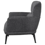 Side view of the Andrea grey crescent arm accent chair with black metal legs.