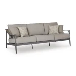 Three-quarter angle view of Akcay gray aluminum outdoor sofa showing wood-tone armrest accent, aluminum frame legs, and cushion depth