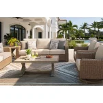 Antalya outdoor sofa set arranged in covered lanai conversation area with coffee table, loveseat, swivel chair and pool view in background