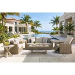 Complete Antalya outdoor furniture set arranged on covered lanai with sofa, loveseat, swivel chair and coffee table near pool