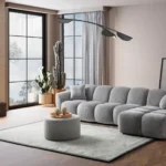 A modern gray boucle L-Shaped sectional sofa with a curved design in a stylish living room.