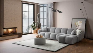 A modern gray boucle L-Shaped sectional sofa with a curved design in a stylish living room.