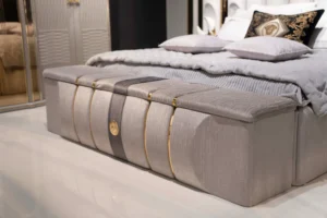 upholstered gray bench with gold accents from modern bedroom set – Tampa