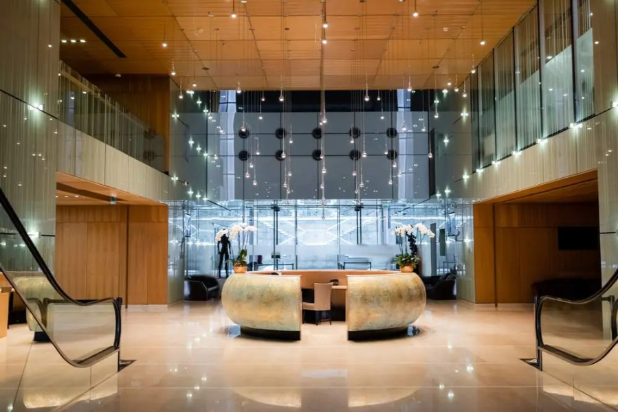 Decorative and architectural contract lighting installations for hotel lobbies and luxury estates — European hospitality lighting Florida