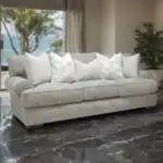 Nerone Light Gray Sofa with oversized cushions and roll arms in a coastal living room.