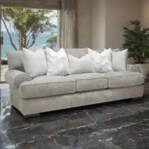 Nerone Light Gray Sofa with oversized cushions and roll arms in a coastal living room.