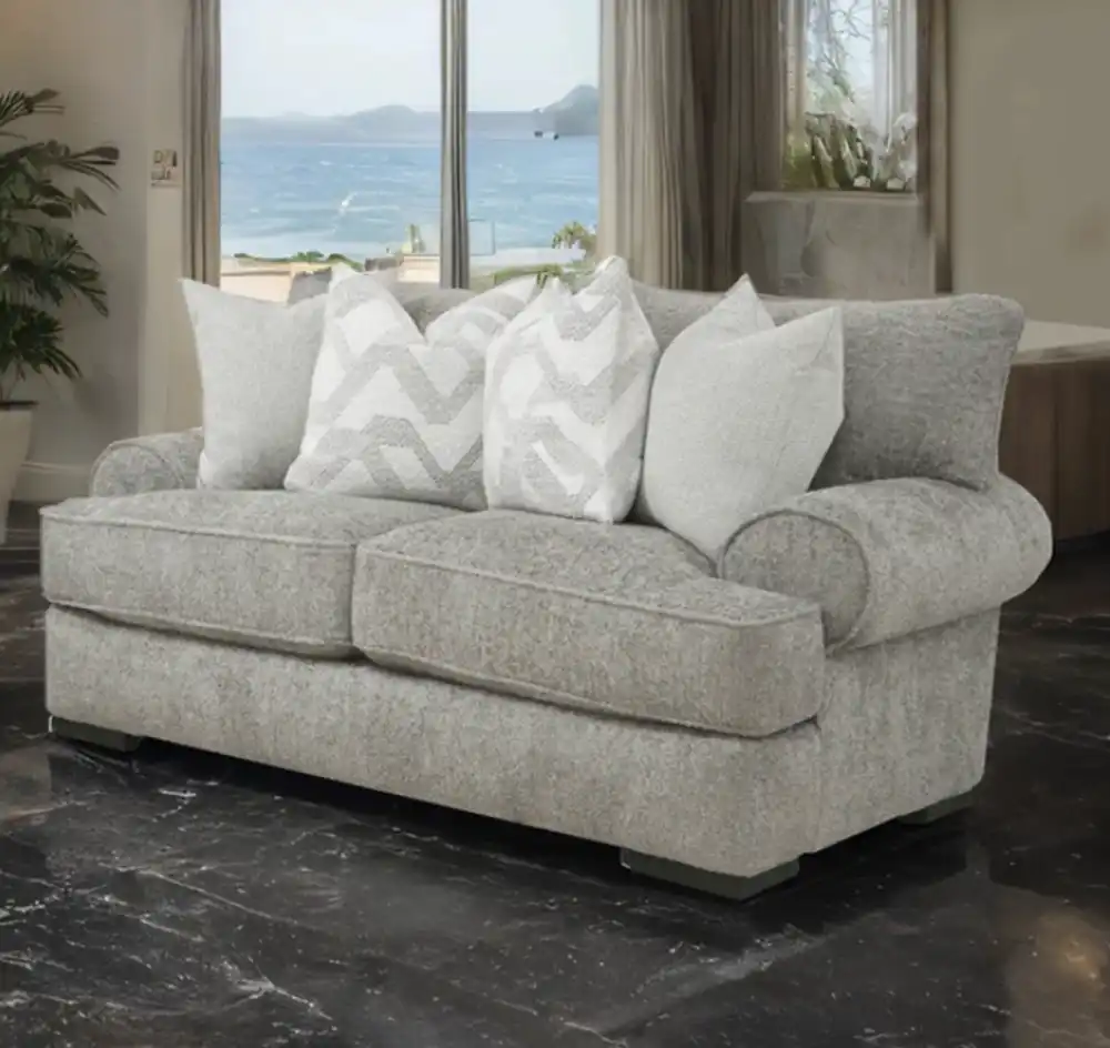 Nerone Light Gray Loveseat with oversized cushions and roll arms in a transitional coastal living room.