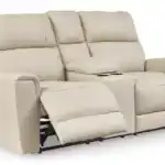 Dahlmoore Power Loveseat with one side reclined, showing the smooth motion and comfortable footrest extension. Features a center console and durable top grain leather.
