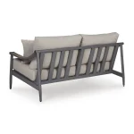 Angled back view of Akcay gray aluminum outdoor loveseat showing vertical slat design and powder-coated frame
