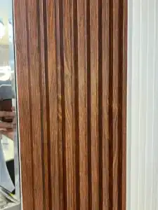 close up of walnut fluted wpc wall panel tampa decorative wall design