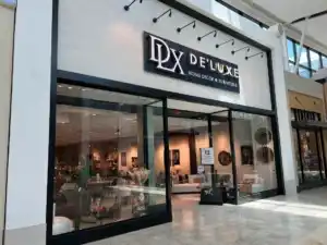 Exterior view of De’Luxe Home Decor & Furniture store in Tampa, Florida