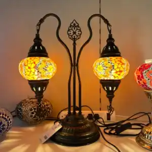 Turkish Mosaic Double Table Lamp with orange and yellow glass mosaic globes, black wrought iron stand, showcasing exotic home accessories available at the home decor store Tampa showroom.