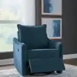 McBurg Swivel Power Recliner in navy, shown in a semi-reclined position in a staged room setting with natural light.