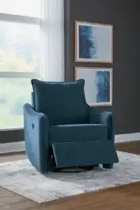McBurg Swivel Power Recliner in navy, shown in a semi-reclined position in a staged room setting with natural light.