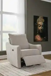 McBurg Swivel Power Recliner in a fully reclined, flat position, staged in a bright room setting.