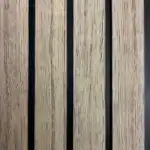 PVC oak fluted wall panel with black channels for modern decorative wall paneling.