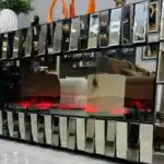 A bronze mirrored electric fireplace tv stand