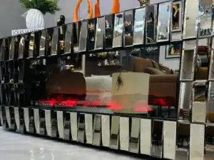 A bronze mirrored electric fireplace tv stand