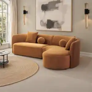 Revello Caramel Brown Sectional Sofa with Curved Design and Accent Pillows in a Contemporary Living Room