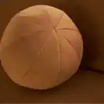 Revello Caramel Brown Sectional Sofa's Ball Pillow