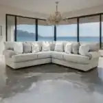 Nerone Gray Sectional Sofa in transitional style with oversized seating, displayed in a modern living room by the ocean view.