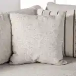 Alameda Sectional Sofa accent pillow in matching natural quartzite fabric.