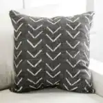 Millburn Sectional Sofa black chevron patterned pillow.