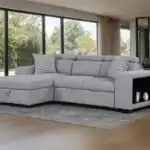 Contemporary Chatteris Gray Sectional Sofa with left chaise and built-in bookcase arm.