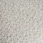 Off-white boucle fabric texture close-up from Moorpark Sectional Sofa.