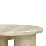 Close-up detail of the Patrizia Coffee Table's smooth, round edge and realistic faux travertine stone texture on the concrete surface. Highlights the neutral color and quality finish.