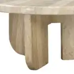 Close-up detail of the Patrizia Coffee Table showing the rounded table edge and the unique curved architectural base in faux travertine concrete. Highlights the sturdy and modern structure.