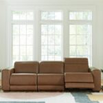 Magic Man brown leather reclining sofa 3-piece power sectional in a modern Tampa living room.
