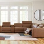 Magic-Man-Brown leather sectional sofa 6-piece power reclining with console and wireless charging in Tampa showroom.