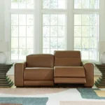 Magic Man 2-piece power reclining sectional loveseat in premium brown leather at Deluxe Home Decor & Furniture Tampa.