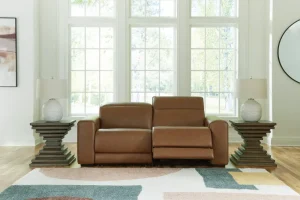 Magic Man 2-piece power reclining sectional loveseat in premium brown leather at Deluxe Home Decor & Furniture Tampa.