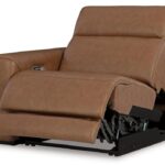 Magic Man brown leather reclining sofa 3-piece power sectional in a modern Tampa living room.