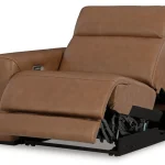 Magic Man 2-piece power reclining sectional loveseat in premium brown leather at Deluxe Home Decor & Furniture Tampa.
