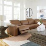 Magic-Man-Brown leather sectional sofa 6-piece power reclining with console and wireless charging in Tampa showroom.