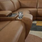 Magic-Man-Brown leather sectional sofa 6-piece power reclining with console and wireless charging in Tampa showroom.